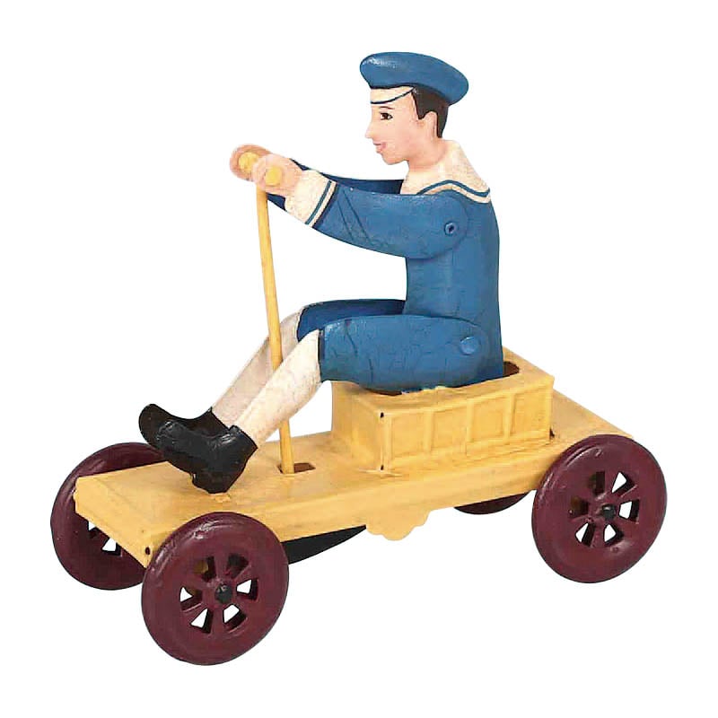 BOY ON PULL CART